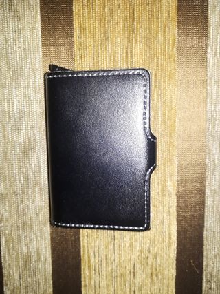 Carteras y monederos en piel 