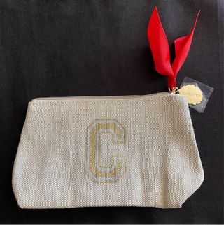 Neceser CLARINS con lazo rojo