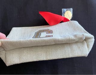 Neceser CLARINS con lazo rojo