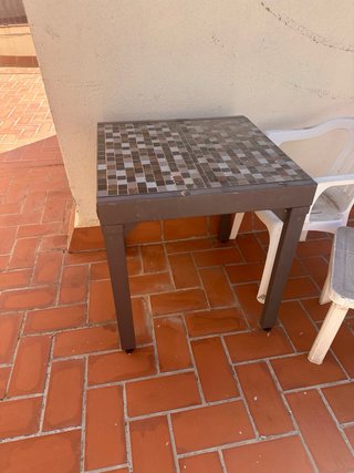 Mesa grande extensible  de hierro para terraza