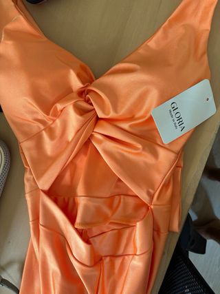 Mono de fiesta naranja. Nuevo