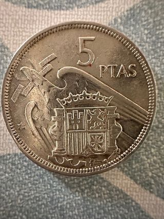 Moneda antigua de Franco 1957