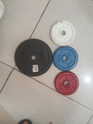 Set 4 mancuernas (2 de 5kg Reebok y 2 de 7 discos)