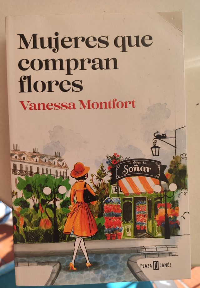 Mujeres que compran flores.