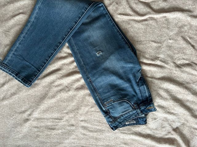 Jeans blu strappati