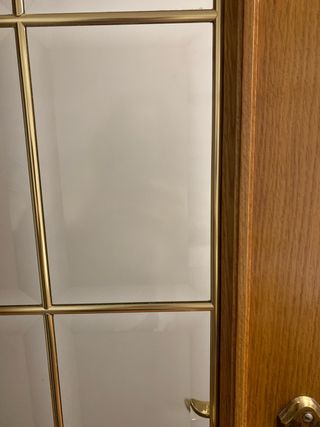 Puerta de madera maciza con cristales biselados