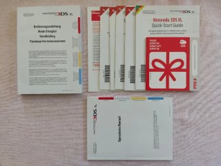 Nintendo 3DS XL rosso con scatola