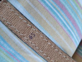 Cinturón color marrón y espigado de cuer