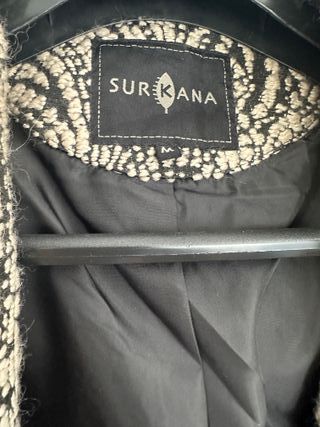 Abrigo elegante Surkana nuevo