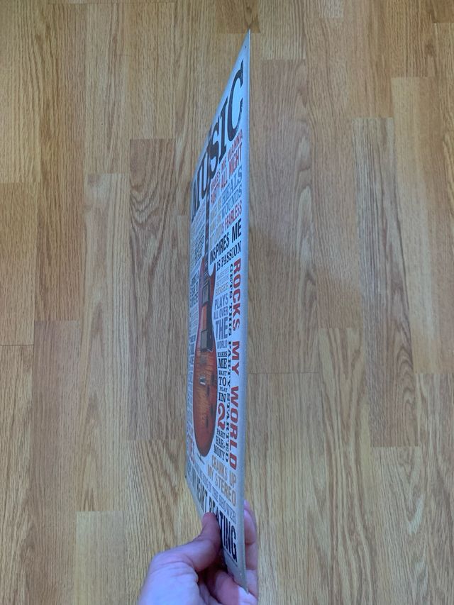 Placa metálica musica