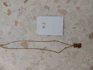 Conjunto de pendiente y collar de gato 