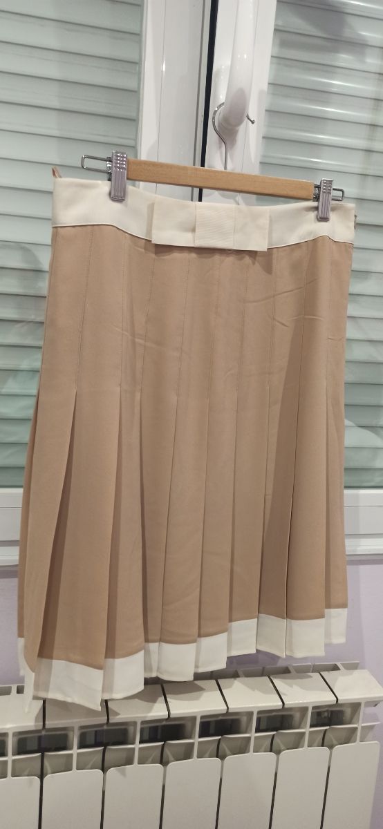 CONJUNTO FALDA Y BLUSA.