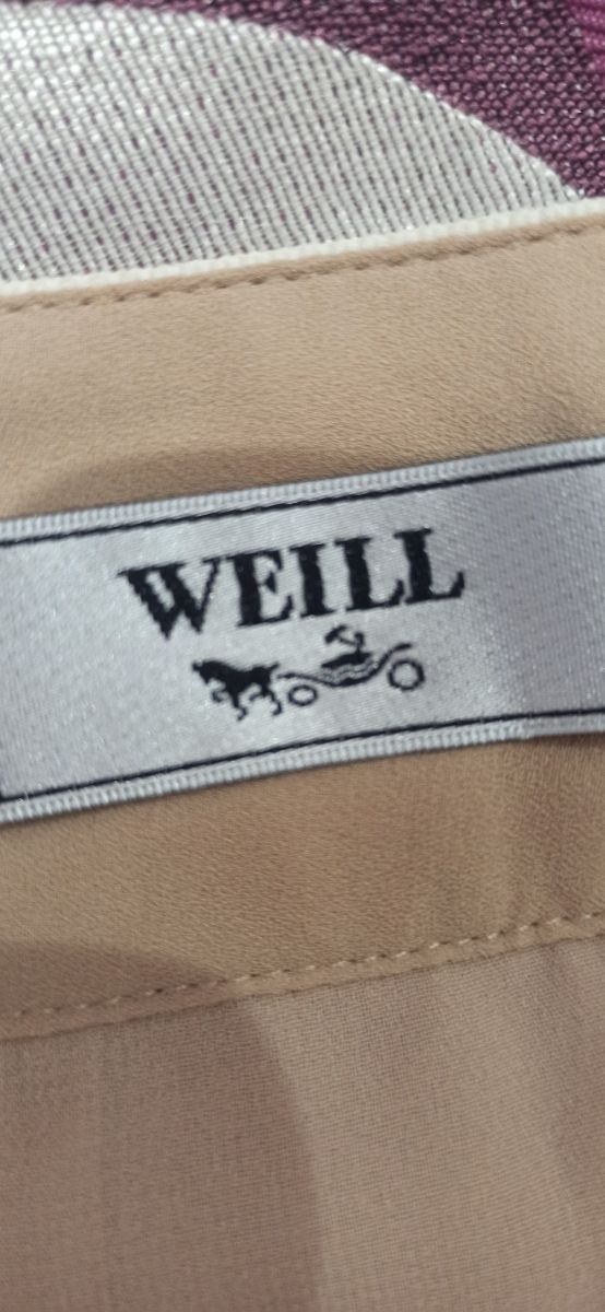 CONJUNTO FALDA Y BLUSA.