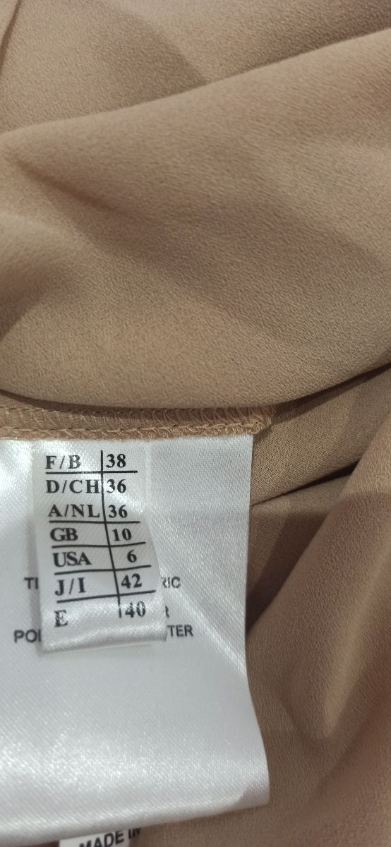 CONJUNTO FALDA Y BLUSA.