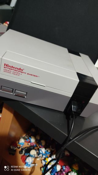 Nintendo ness y juego pitufos 