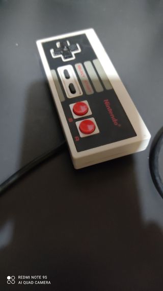 Nintendo ness y juego pitufos 