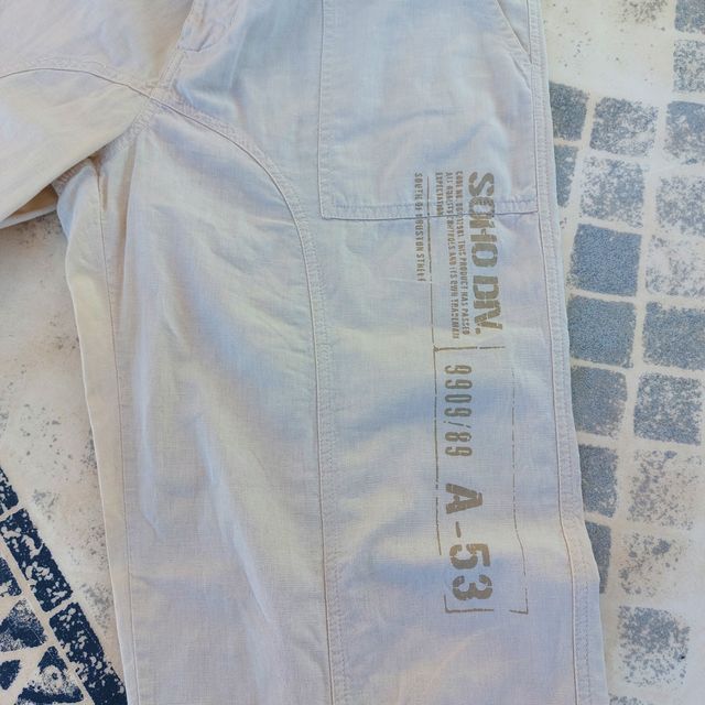Pantalon beige claro talla L pull and bear