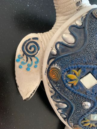 Tartaruga decoro casa bianca e blu