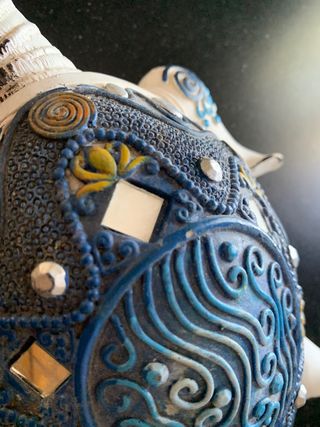 Tartaruga decoro casa bianca e blu