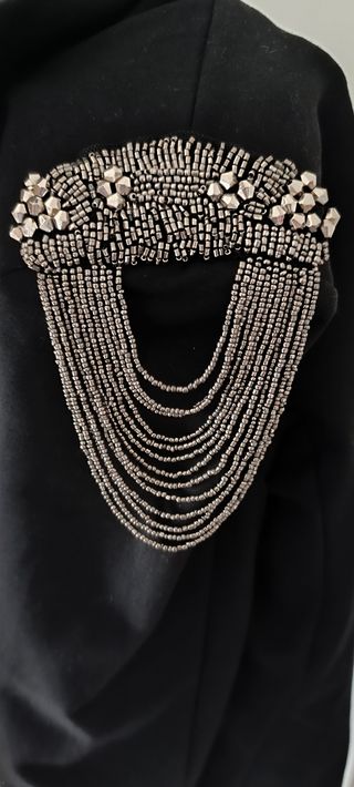 Chaqueta militar cadenas en hombros