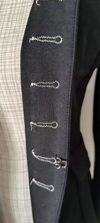 Chaqueta militar cadenas en hombros