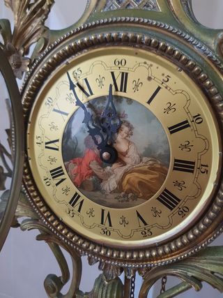 Reloj de bronce pared