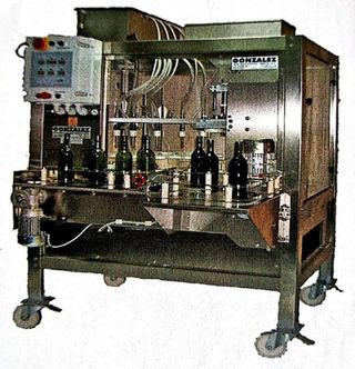 LLENADORA-TAPONADORA MBL 100