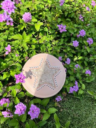 Bolso rosa con estrella dorada