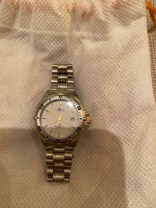 Reloj acero y oro Lotus