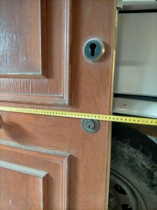 Puerta madera de entrada (sin marco).