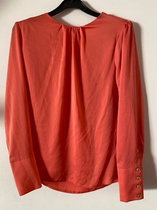 blusa coral de fiesta. Talle L