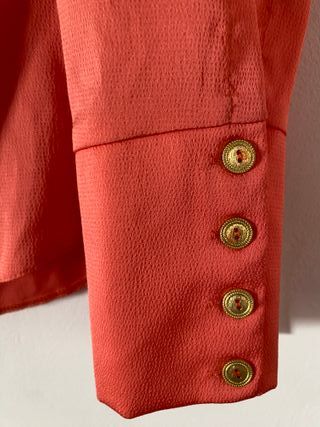 blusa coral de fiesta. Talle L