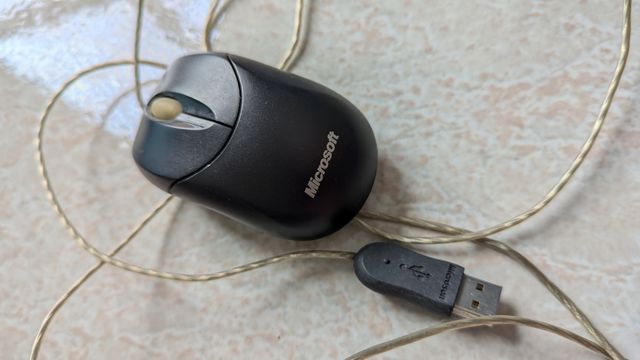 Mouse Microsoft compatto 1016