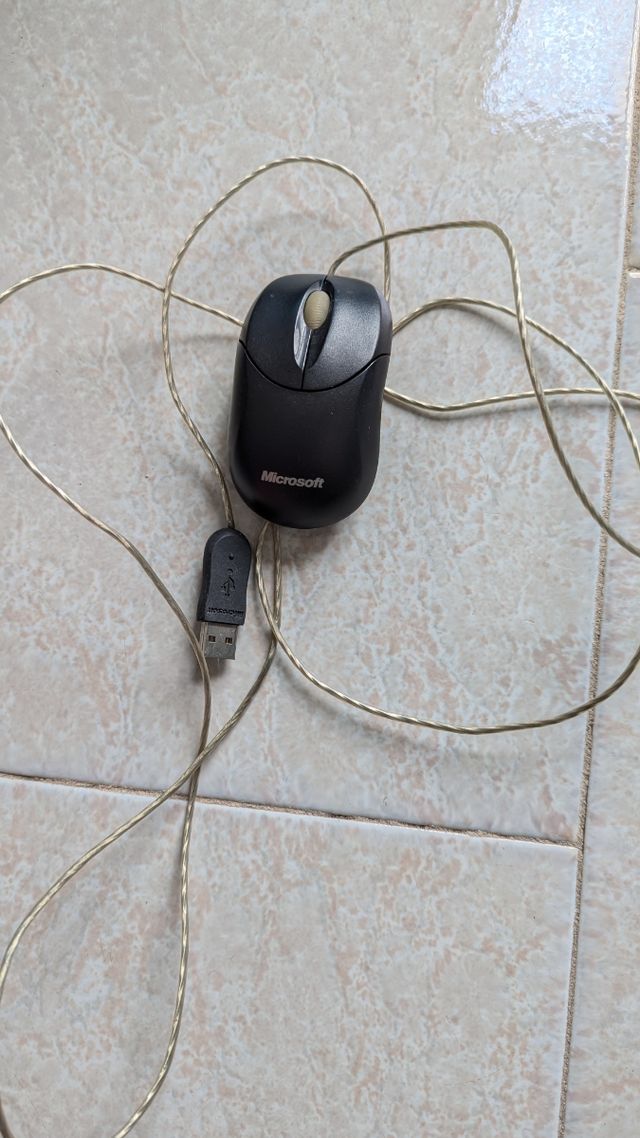 Mouse Microsoft compatto 1016