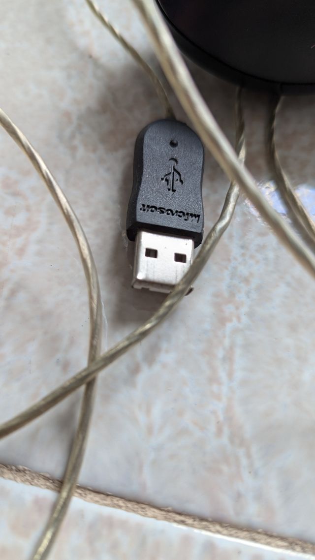 Mouse Microsoft compatto 1016