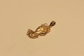 COLGANTE VIRGEN NIÑA DE ORO 18K/1.3Gr
