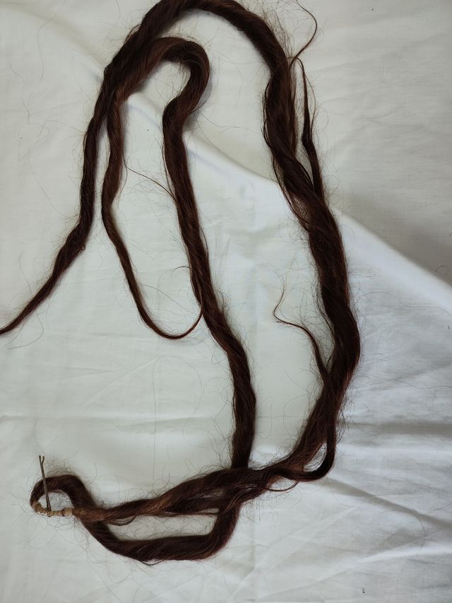 Dos mallas de pelo natural color cobrizo