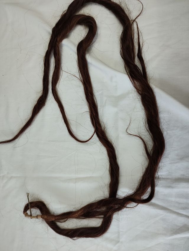 Dos mallas de pelo natural color cobrizo