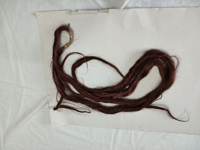 Dos mallas de pelo natural color cobrizo