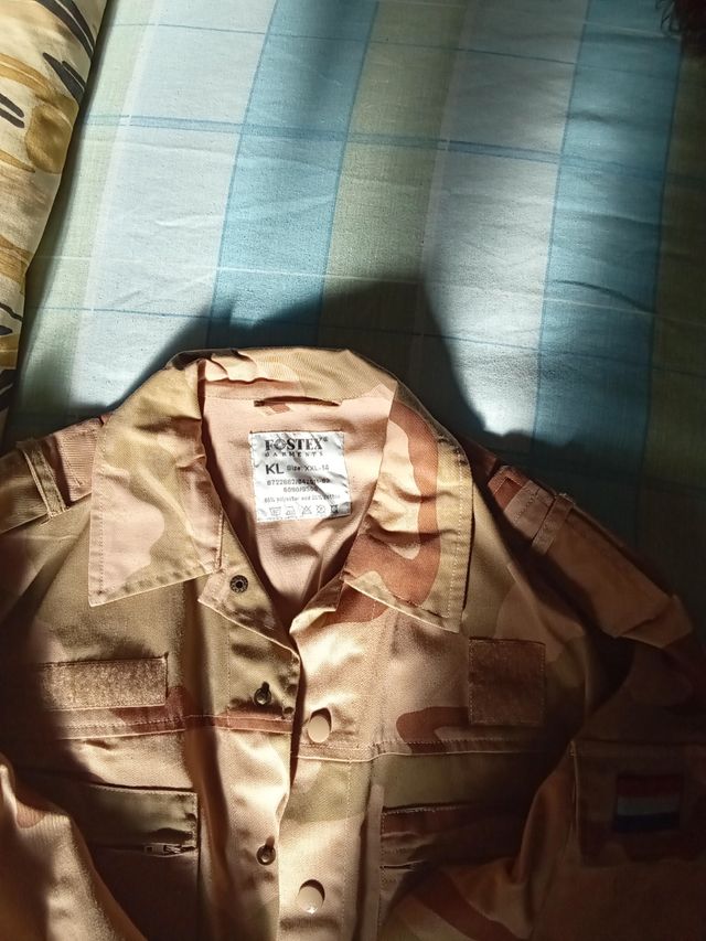 Traje camuflaje y chaleco t 14