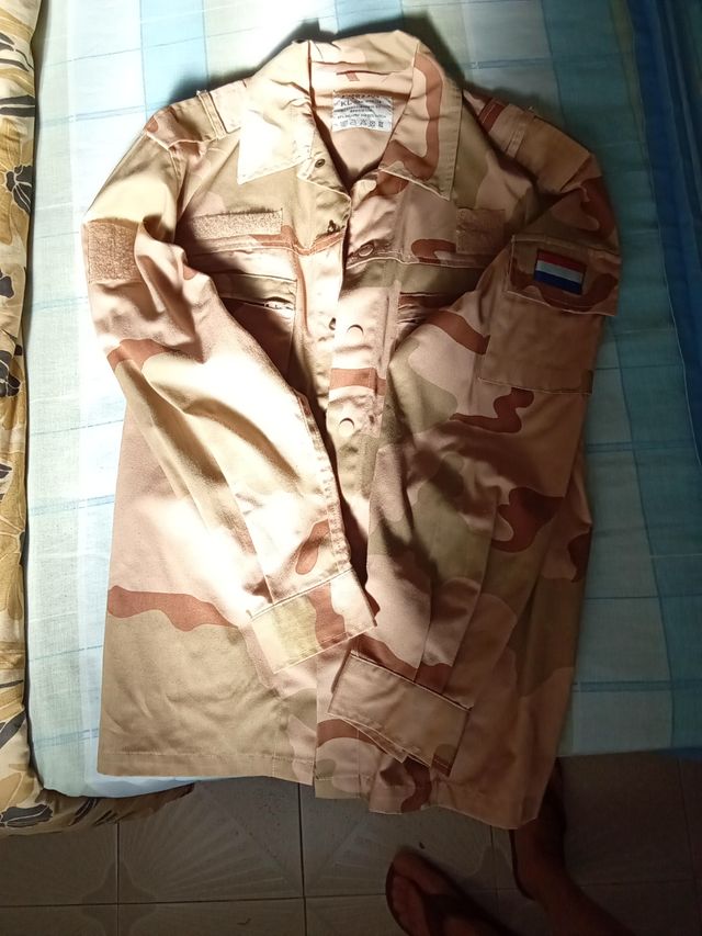 Traje camuflaje y chaleco t 14