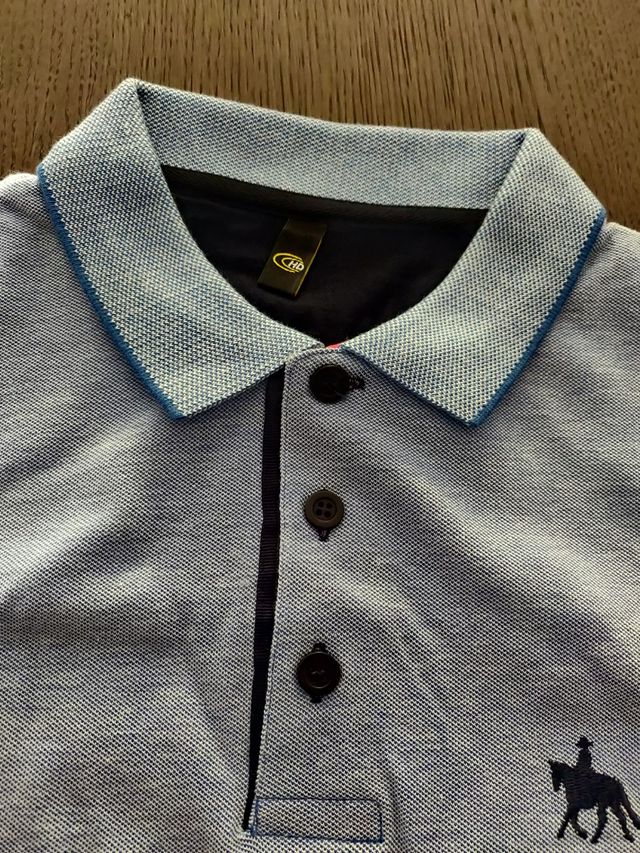 Polo azul claro nunca usado