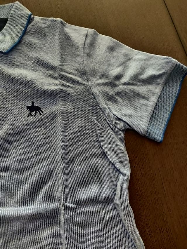 Polo azul claro nunca usado