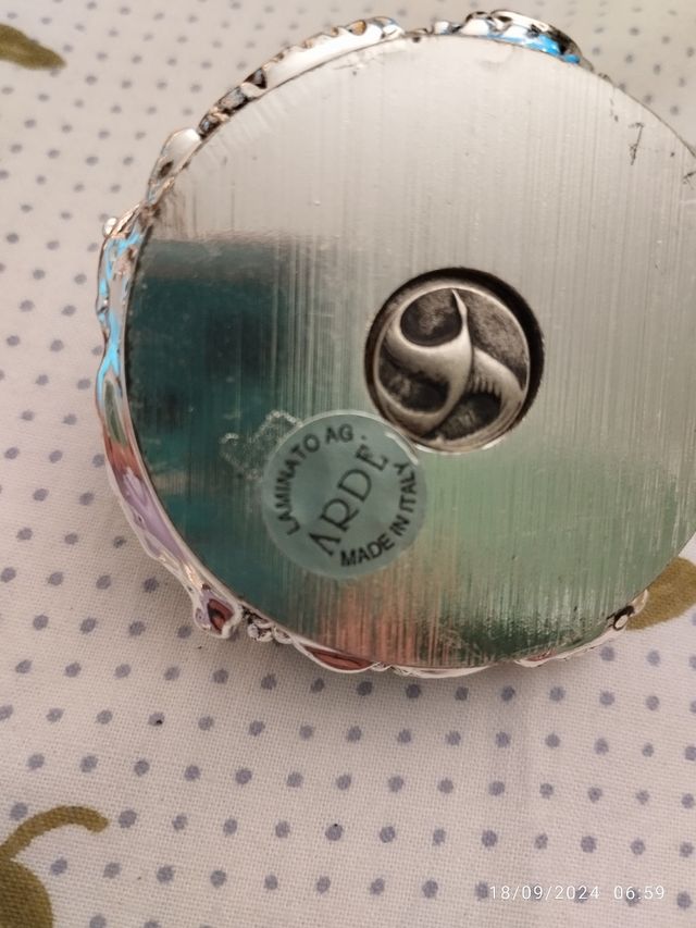 Laminato argento. Portacandela