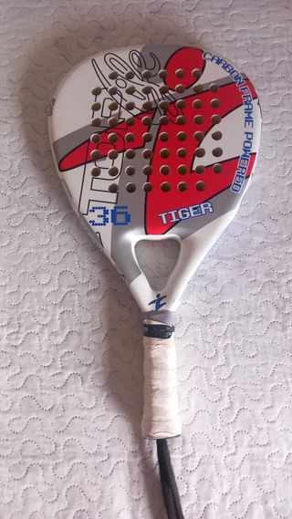 2 raquetas de pádel y 1 de tenis