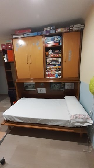 Cama abatible con armarios