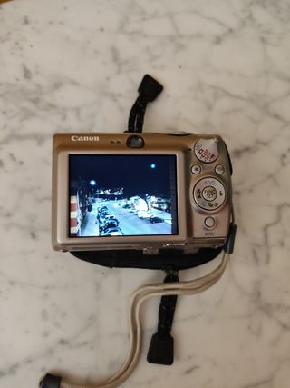 Cámara de fotos digital ...con funda..