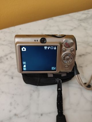 Cámara de fotos digital ...con funda..