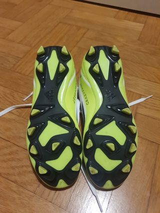 Botas niño fútbol con tacos Adidas
