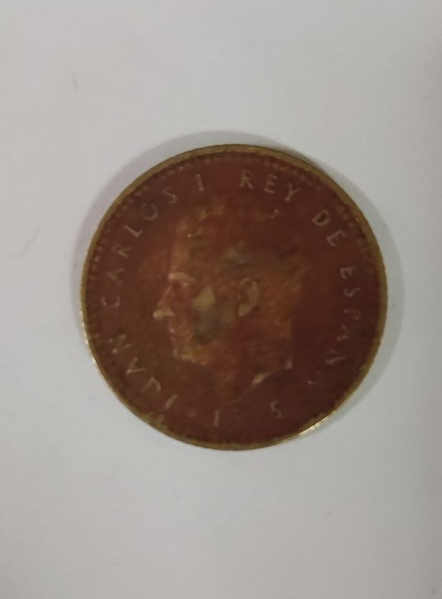 1 Peseta